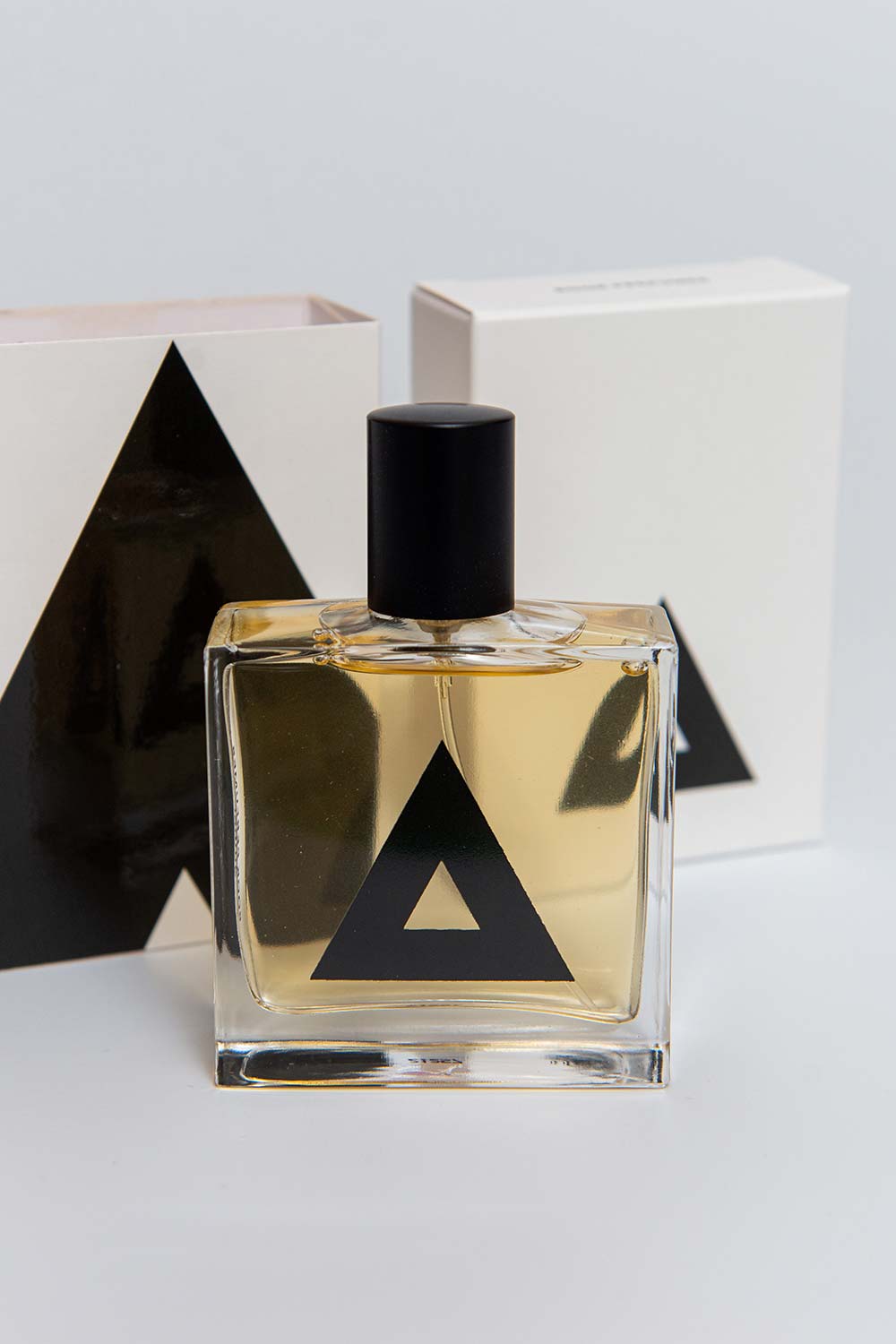 Rook Amber perfume bottle and packaging unboxed
